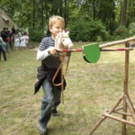 Roland reiten mit einem Steckenpferd